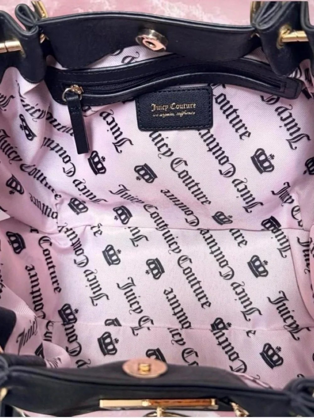 Juicy Couture Rolling On Satchel in the color licorice